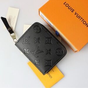 Louis Vuitton Black Embossed Monogram Wallet
